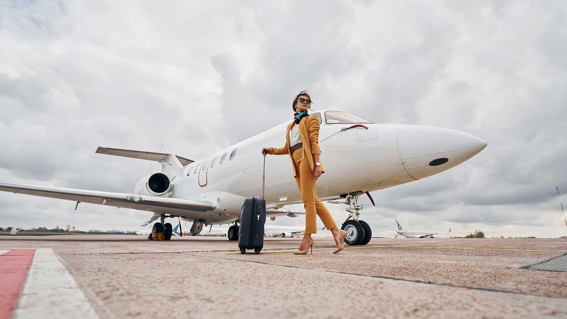 elegant-clothes-young-woman-with-luggage-is-outdo-2025-03-18-19-39-58-utc